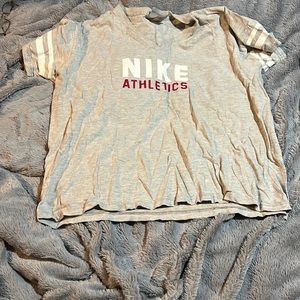 Grey Nike athletics tee shirt